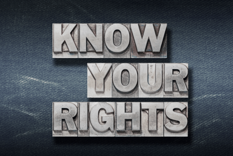 Image is of metal print blocks the spell 'Know Your Rights', concept of knowing your rights after being arrested in Gainesville