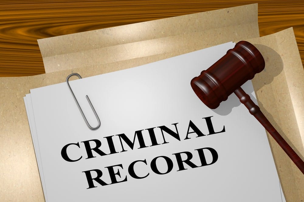Image is of a criminal record document with a judge’s gavel, showing how a DUI stay on your record as a permanent criminal offense under Florida law.